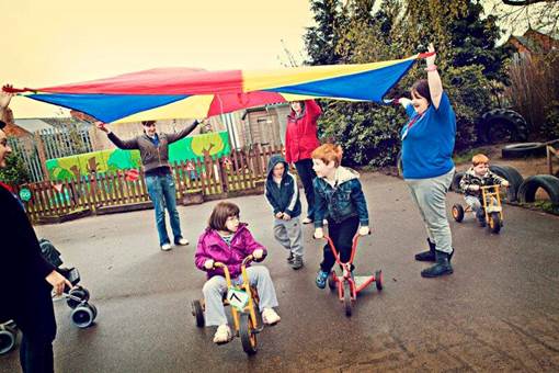 Children playing outdoors on a Chyps playscheme